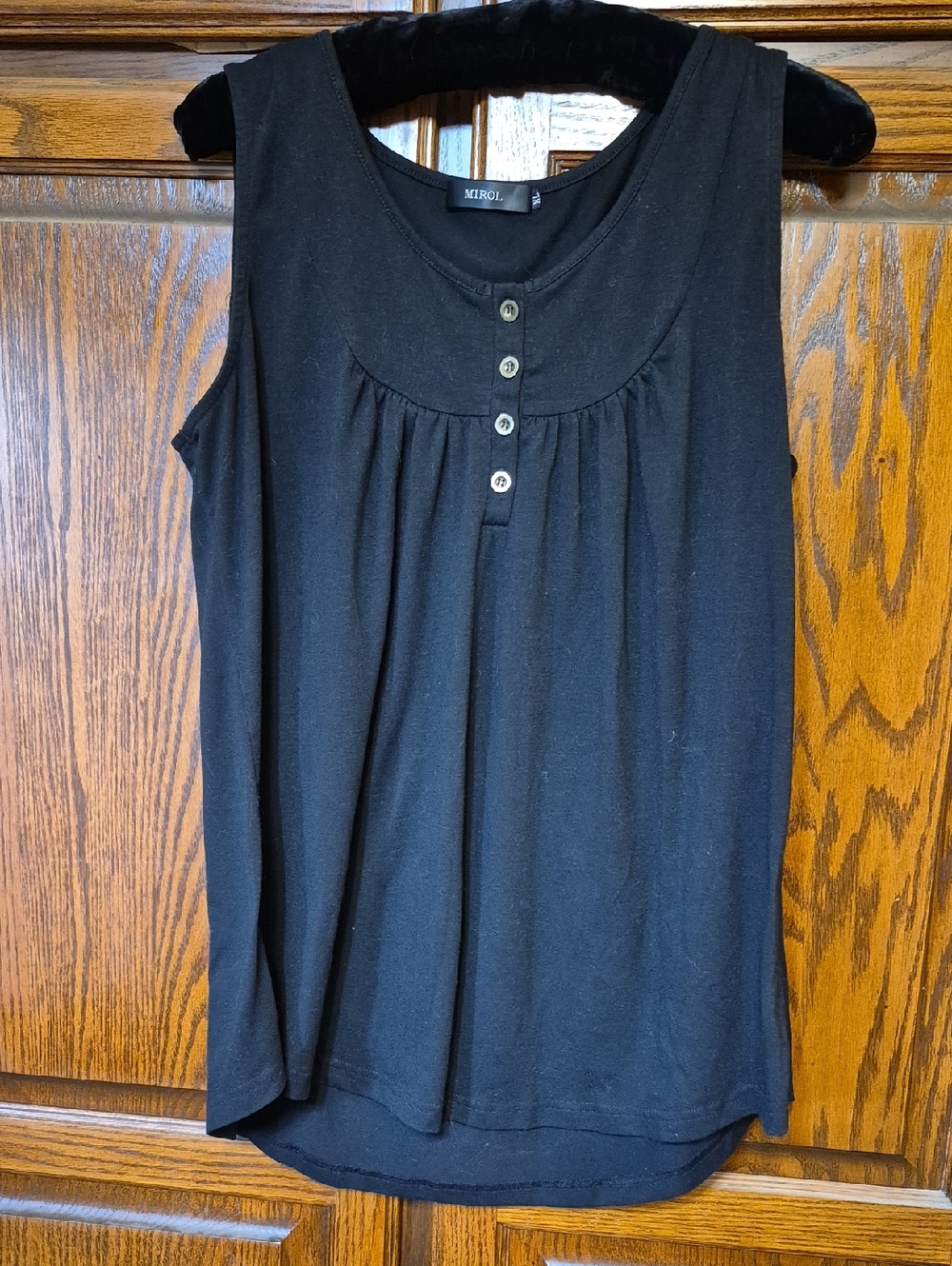 Black Sleeveless Button-Front Knit Top